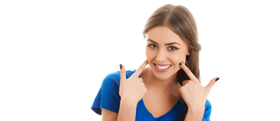 Woman Smiling Pointing at Her Teeth