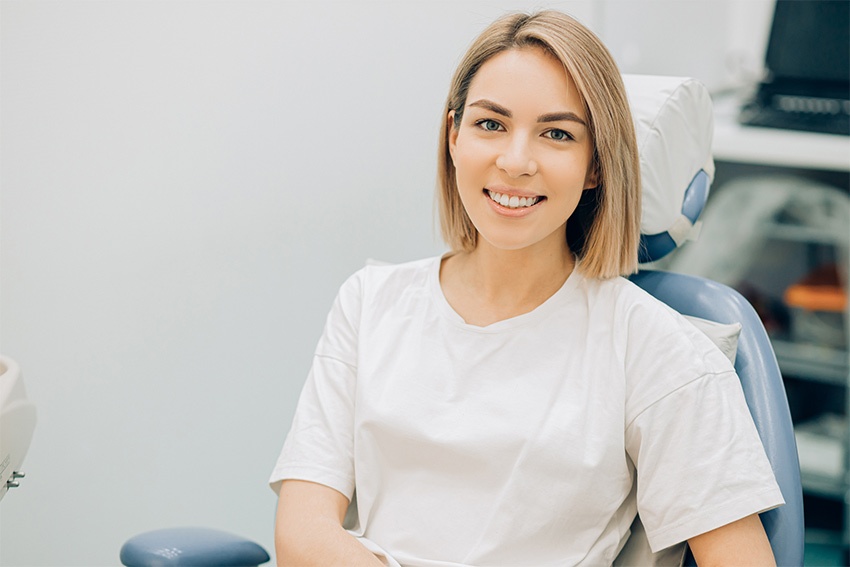 Woman in Dental Chair Smiling