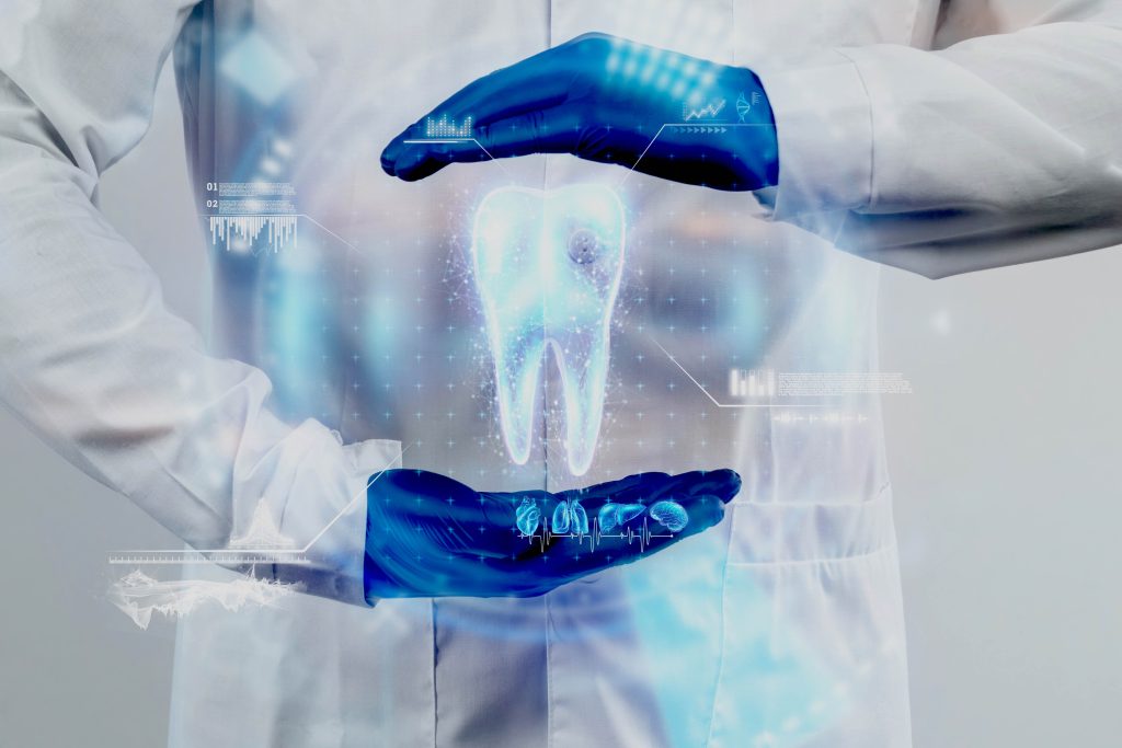 Dentist holding virtual dental implant